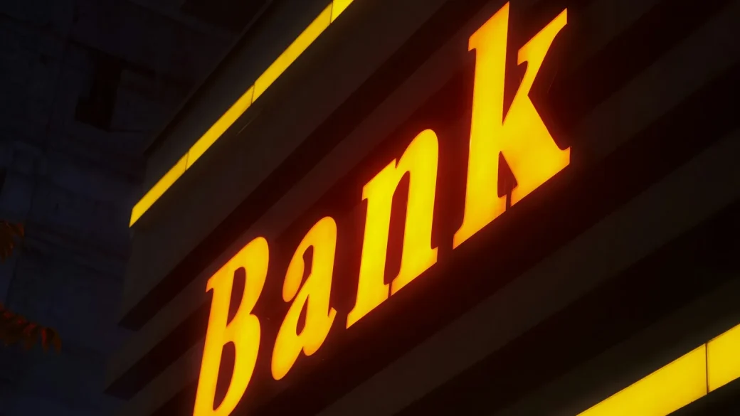 smartphone showing a bank fraud alert notification on the lock screen