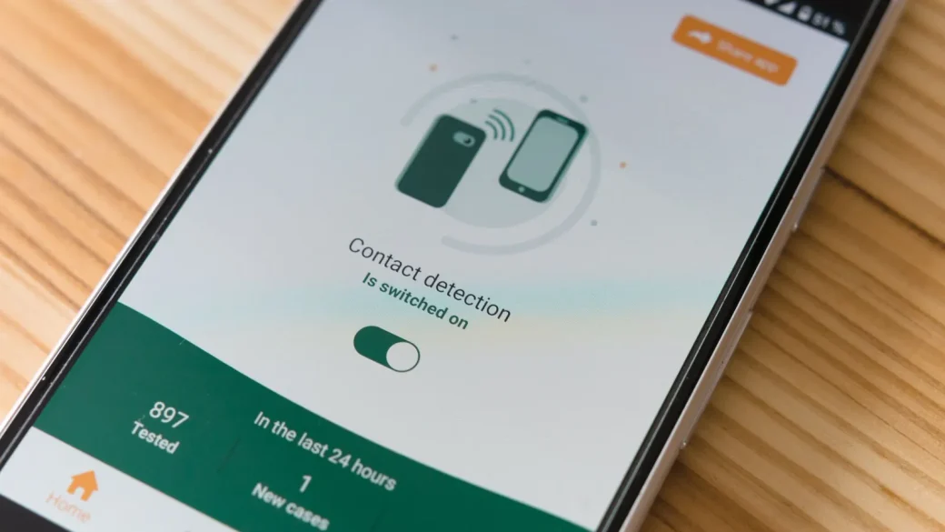 hand tapping a settings switch on a phone screen