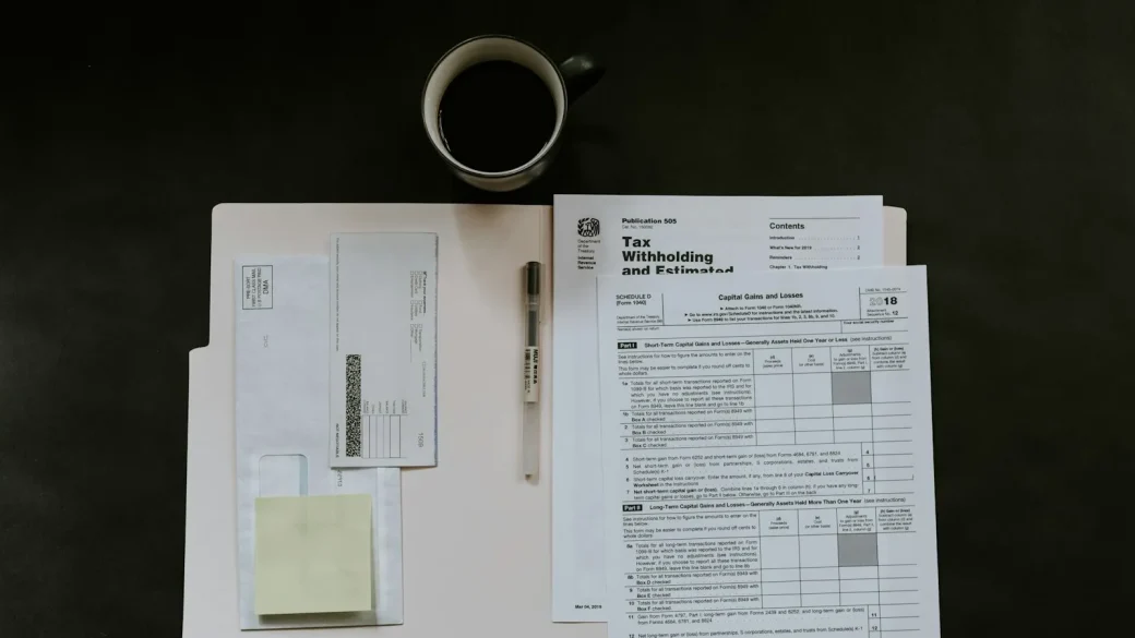 a printed invoice with altered bank details highlighted