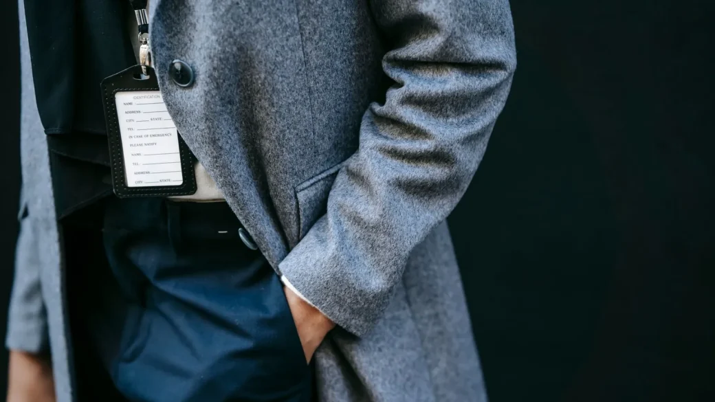 person realizing phone is missing from coat pocket