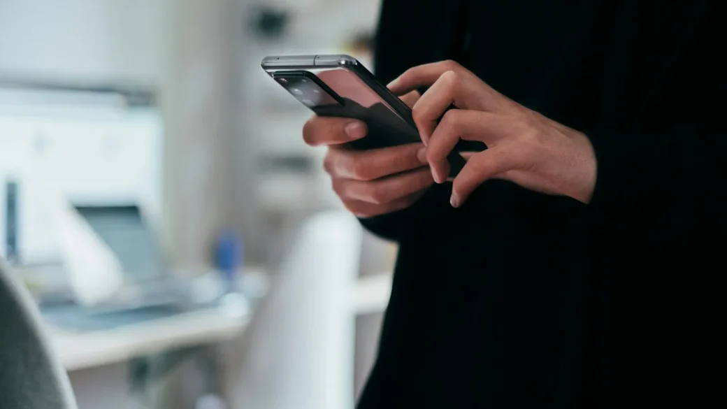 person adjusting privacy settings on a phone