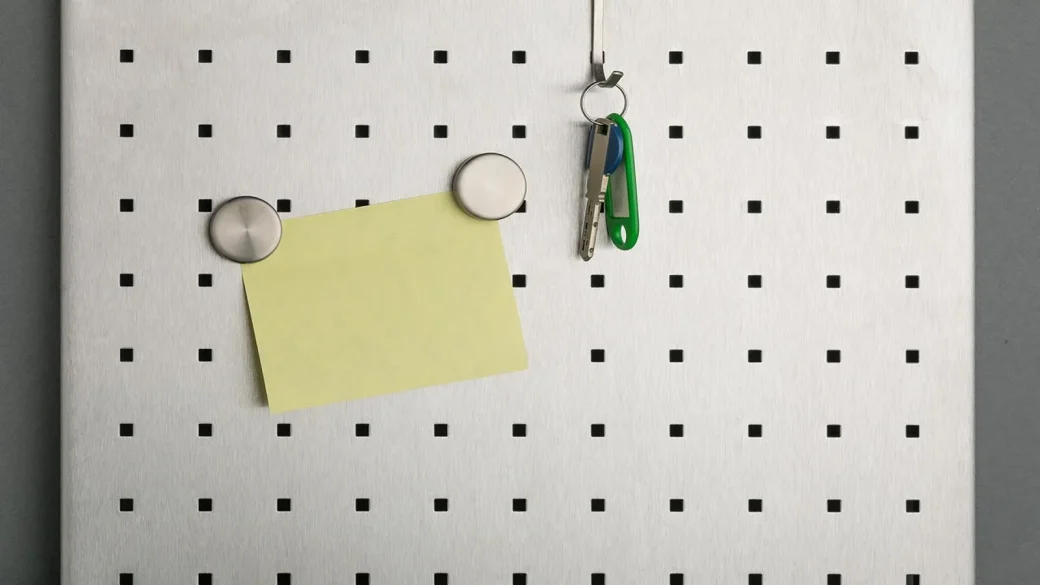 A sticky note showing four random words as a passphrase example