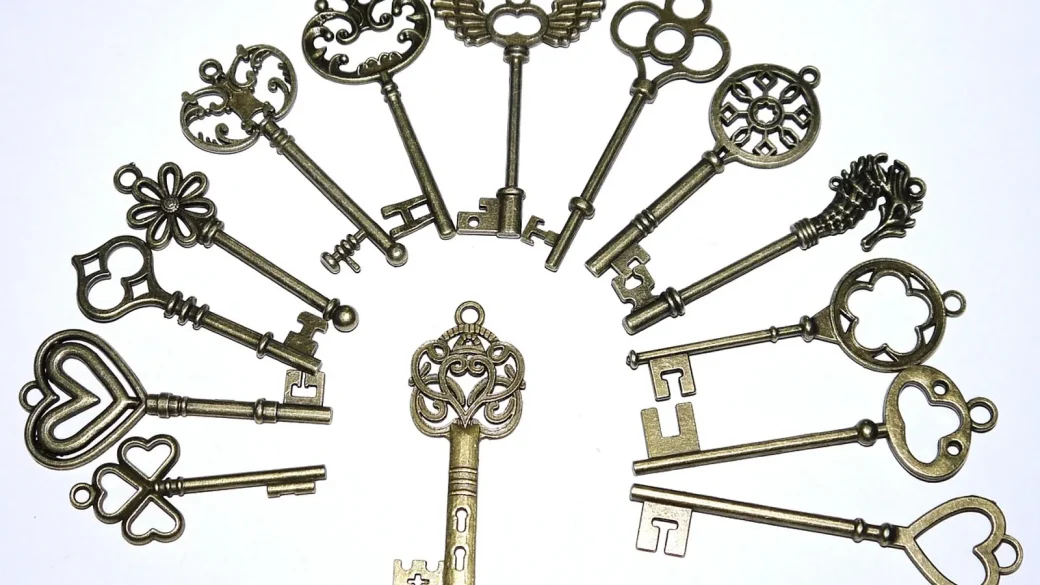 One key held in front of a row of identical doors