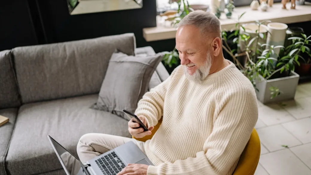 an older person looking uncertain during a phone call