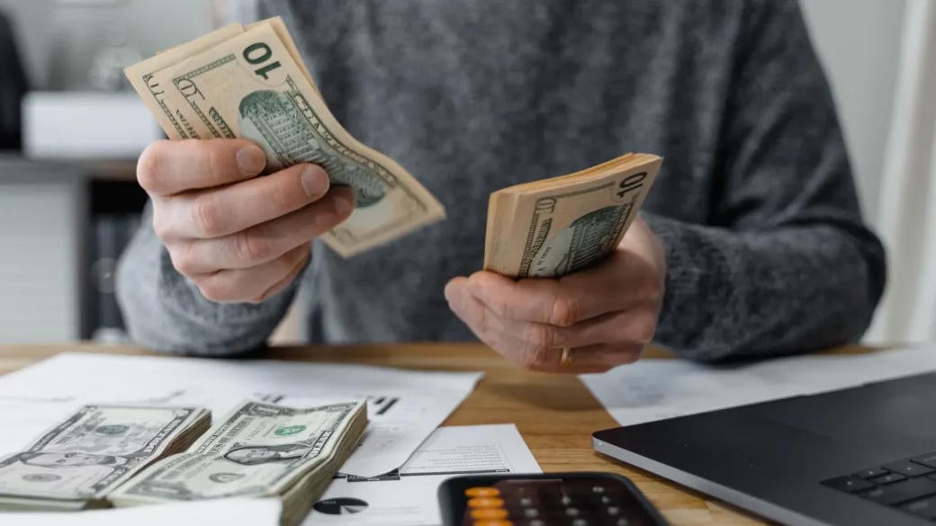 person checking a bank refund notification on a phone