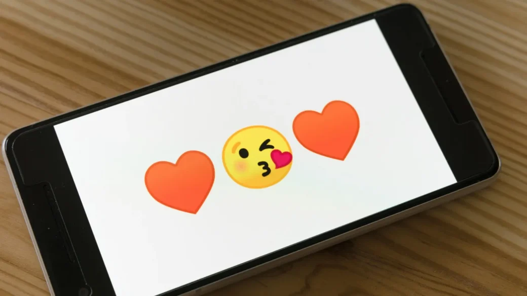 person reading affectionate message on a phone at night