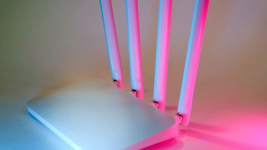 home wifi router with status lights on a shelf
