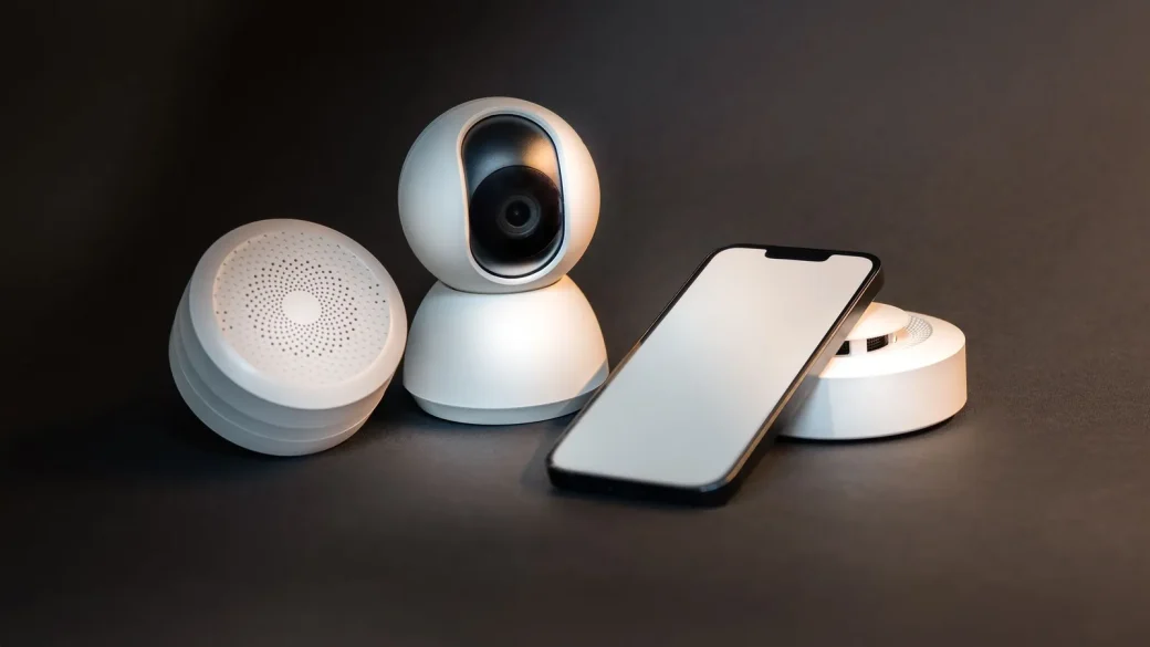 smart speaker plug and bulb on a table at home
